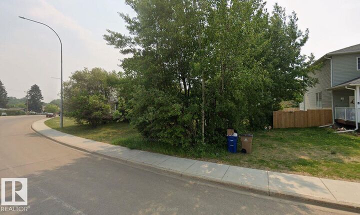 Property Photo:  9124 100 Street  AB T0A 2C0 