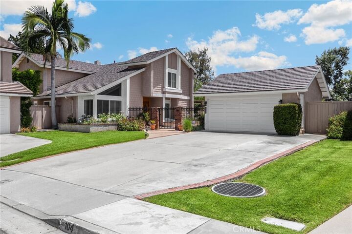 Property Photo: 104 Morningflower CA 92821