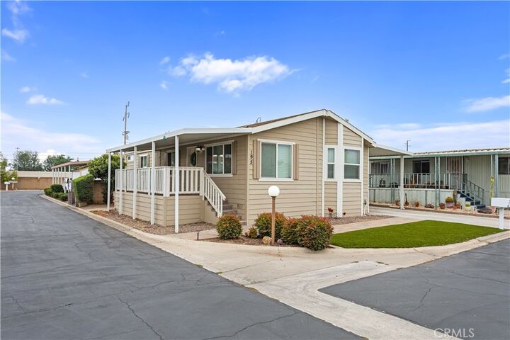 Property Photo:  23820 Ironwood Ave 195  CA 92557 