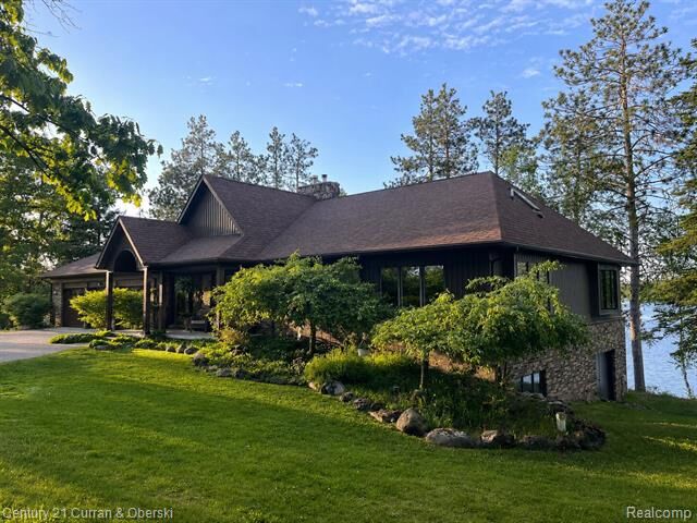 Property Photo:  8775 Winding Ridge Drive  MI 49759 