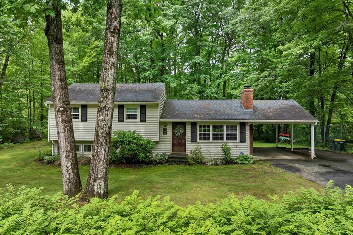 Property Photo: 64 Woodvale Drive NH 03246