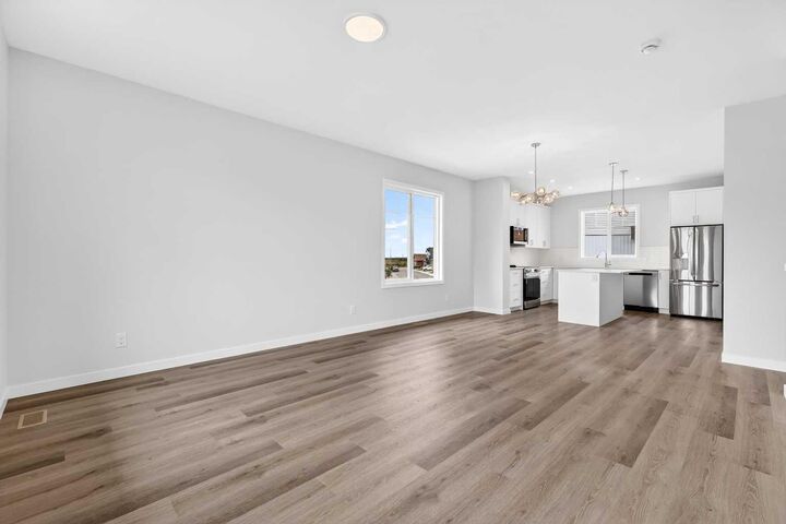 Property Photo:  132 Red Embers Link NE 1025  AB T3N 2X8 