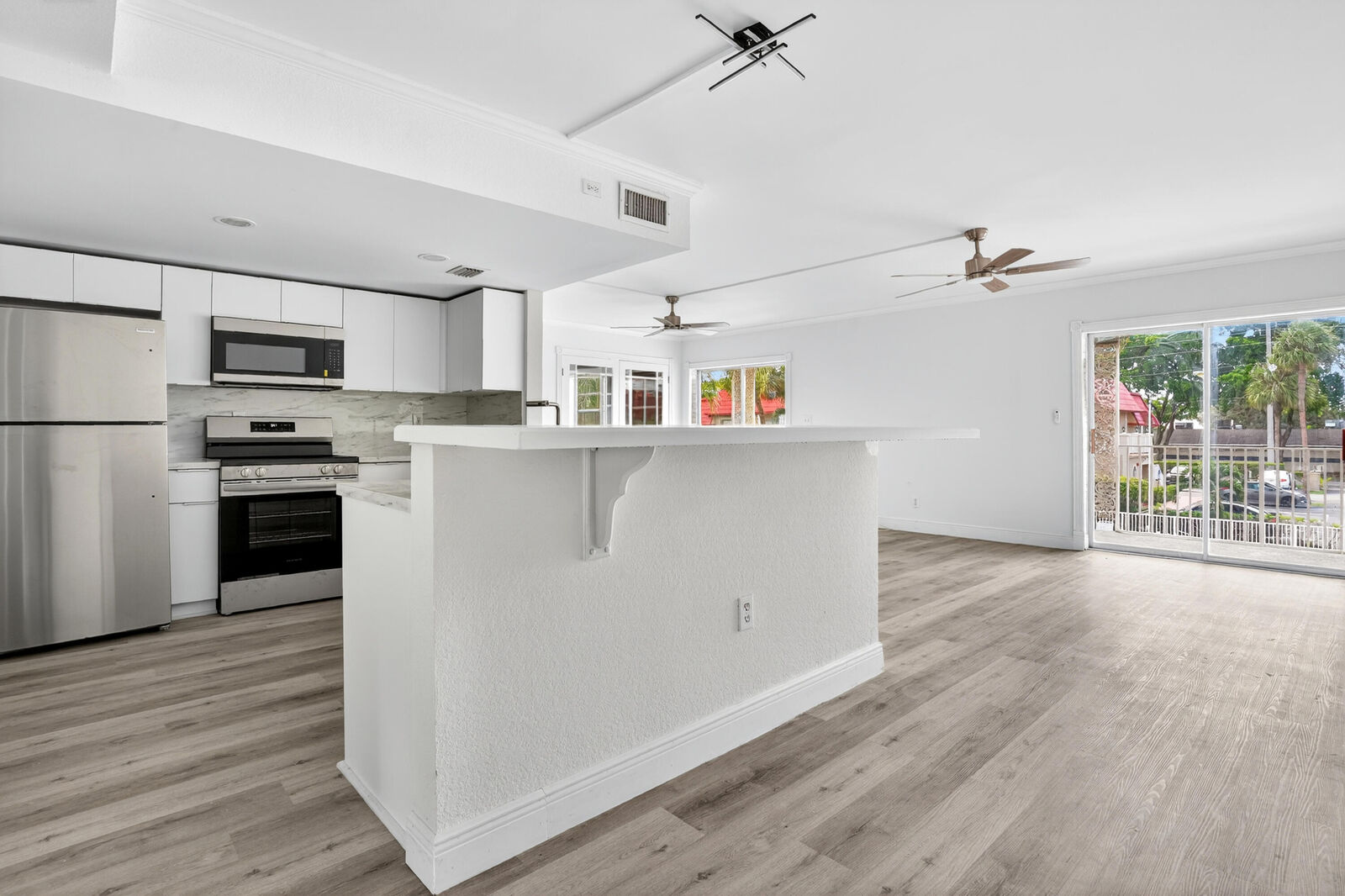 Property Photo: 495 SE 8th Street 242 FL 33441