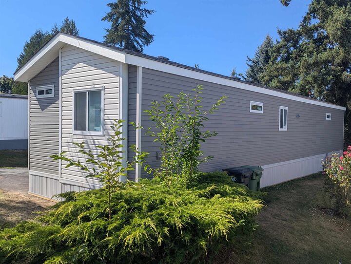 Property Photo: 8220 King George Boulevard 104 BC V3W 6B1