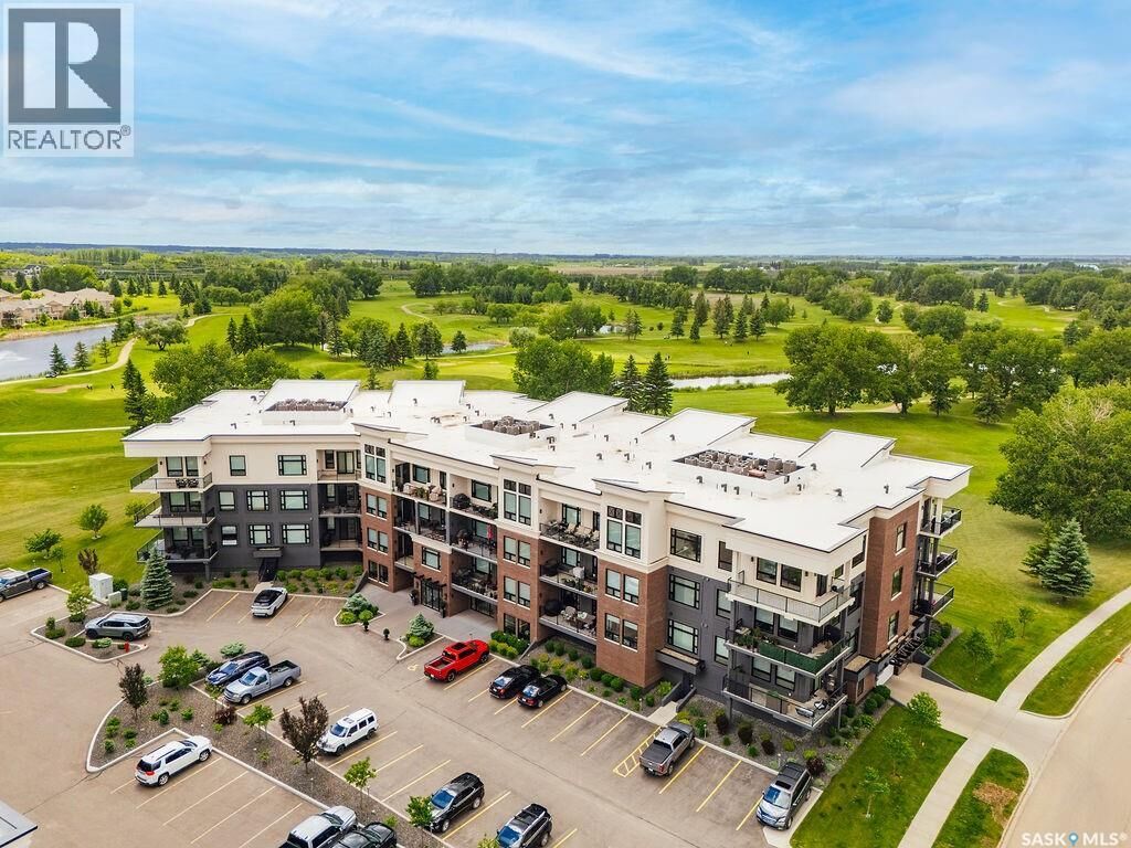 Property Photo:  107 404 Cartwright Street  SK S7T 0W6 
