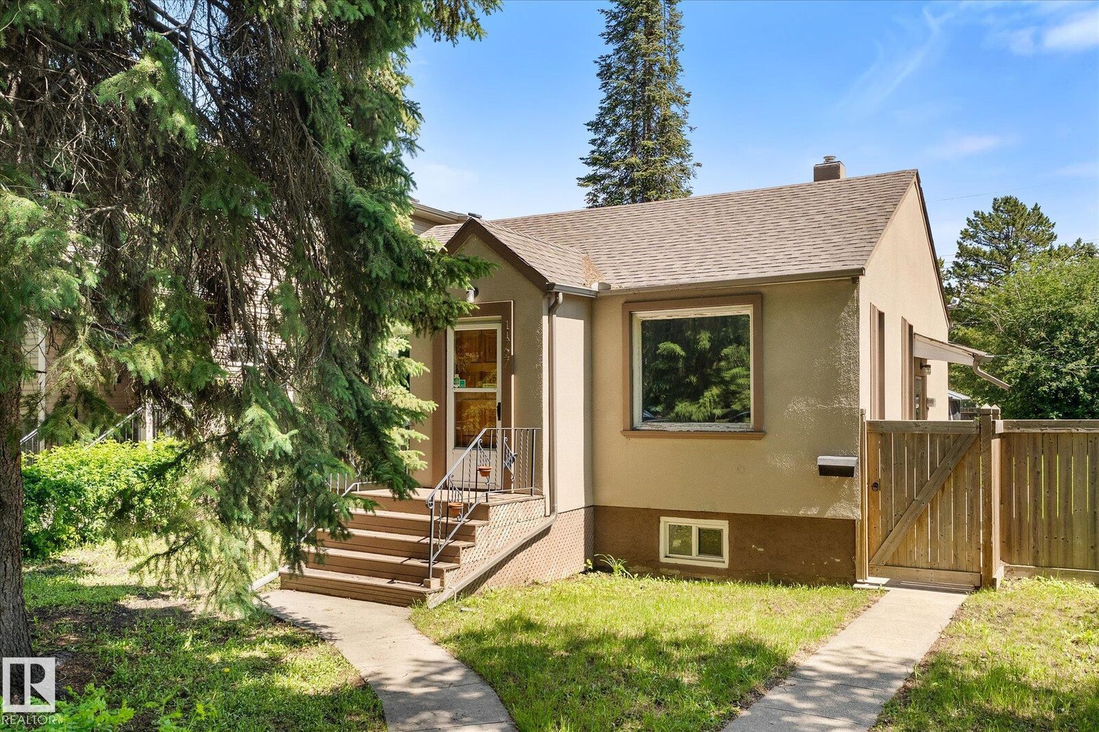 Property Photo:  11727 129 Street NW  AB T5M 0Y8 