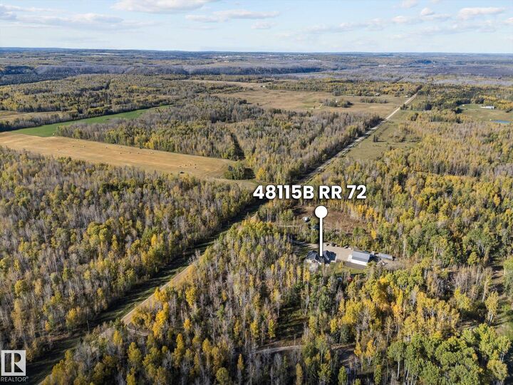 Property Photo:  48115B Rge Road 72  AB T7A 2A2 