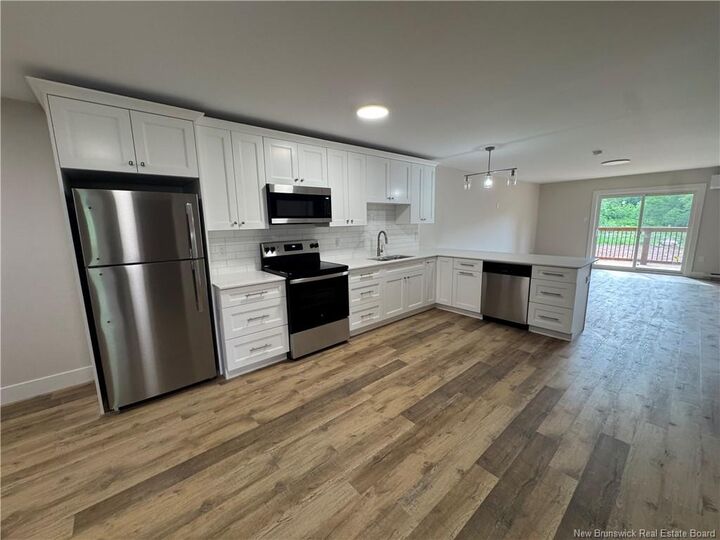 Property Photo:  268 Main Street 304  NB E5N 6B8 