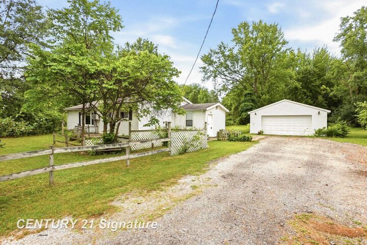 Property Photo:  12097 Swan Creek Road  MI 48609 