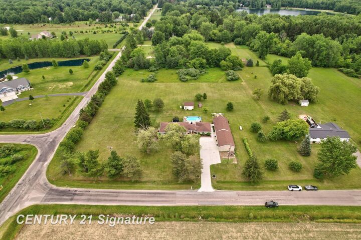 Property Photo:  2051 S Brennan Road  MI 48626 