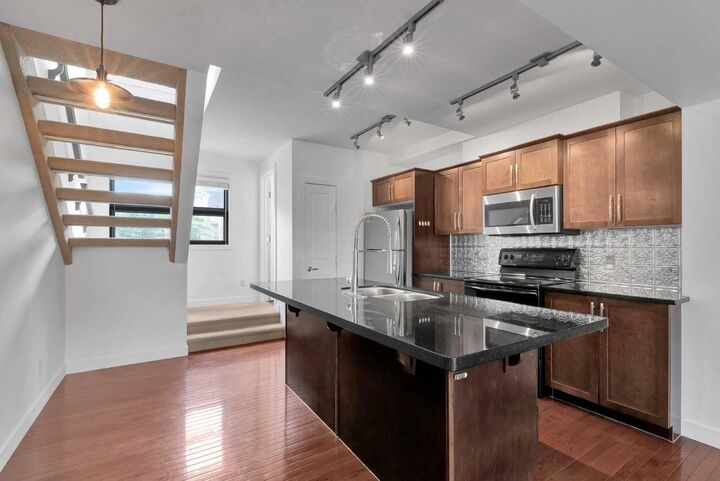 Property Photo:  55 Aspen Hill Green SW  AB T3H 0H6 