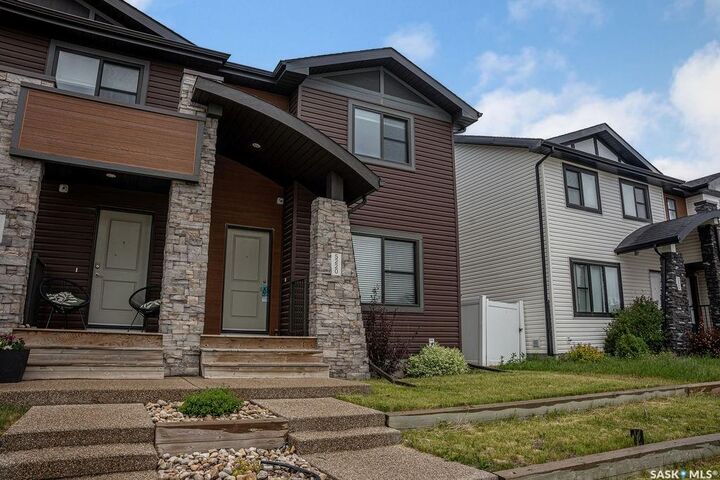 Property Photo:  5220 Primrose Green Drive E  SK S4V 3S8 