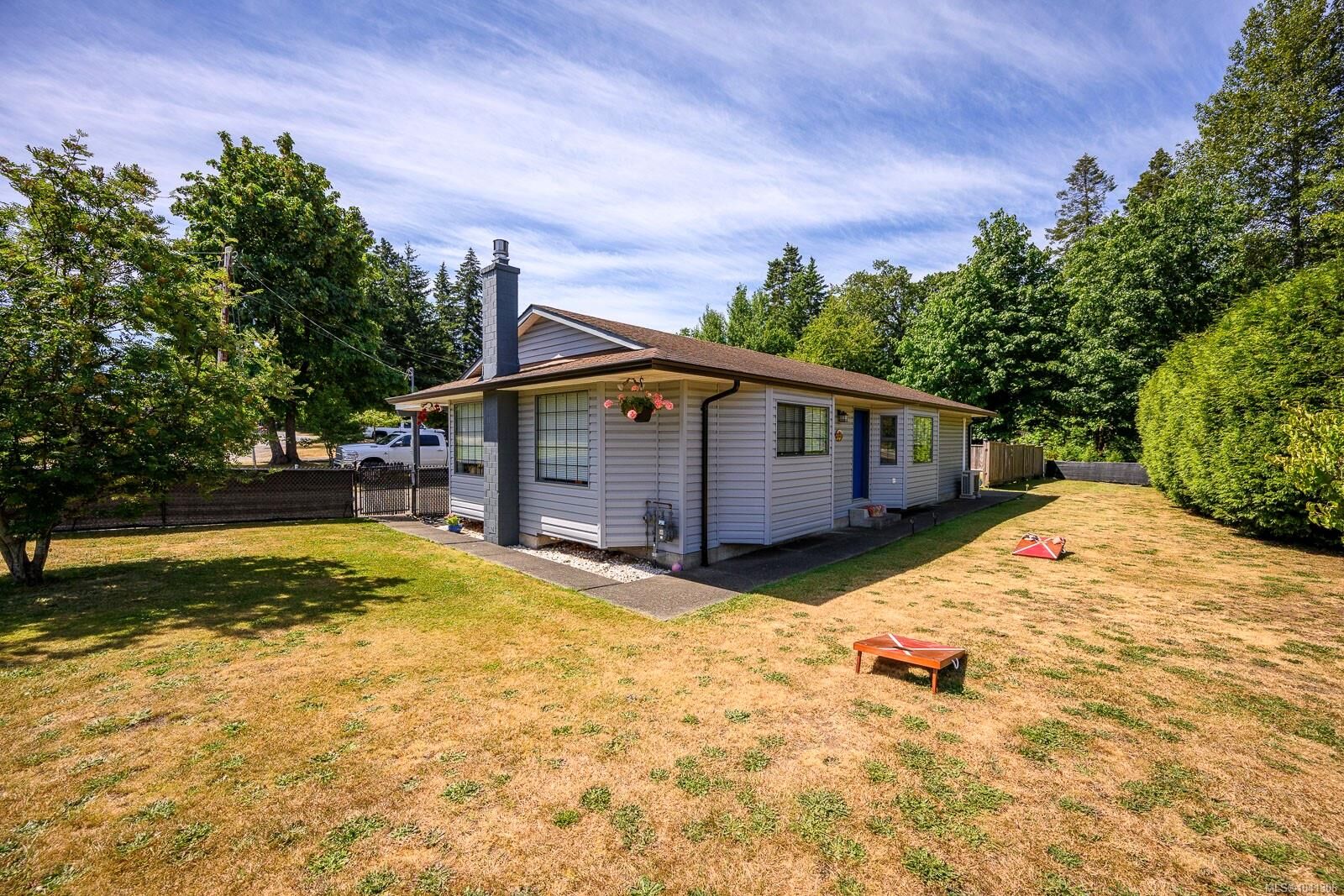 Property Photo:  4863 Dundas Rd  BC V9N 5Y2 