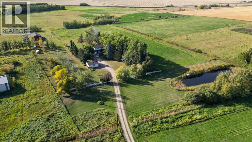 Property Photo:  260195 274 Range Road  AB T4A 1J1 