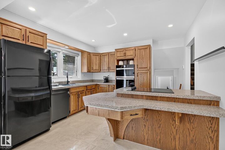 Property Photo:  7707 156 Street NW  AB T5R 1X6 