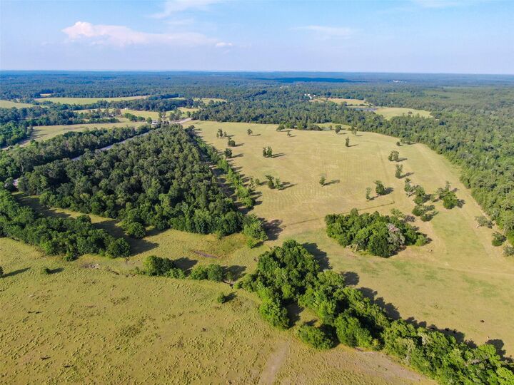 Property Photo: 6600 State Highway 150 W TX 77331