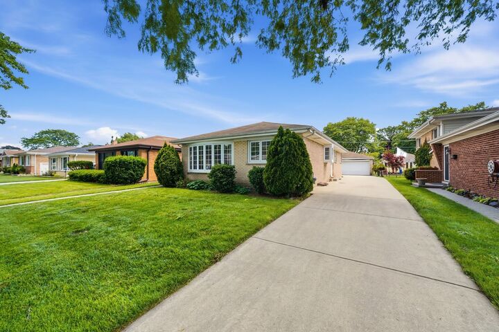 Property Photo:  5835 Reba Street  IL 60053 