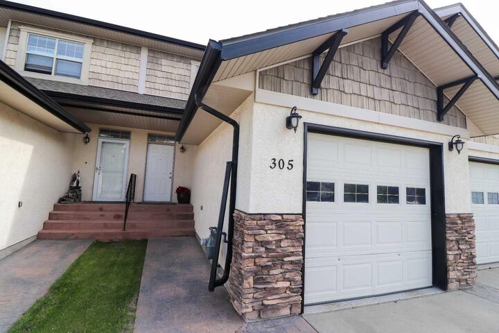 Property Photo:  305 Addington Drive  AB T4R 3H7 