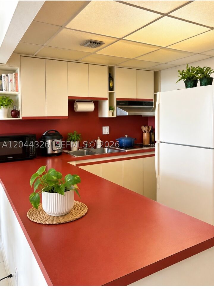 Property Photo:  1825 W 44th Pl 806  FL 33012 