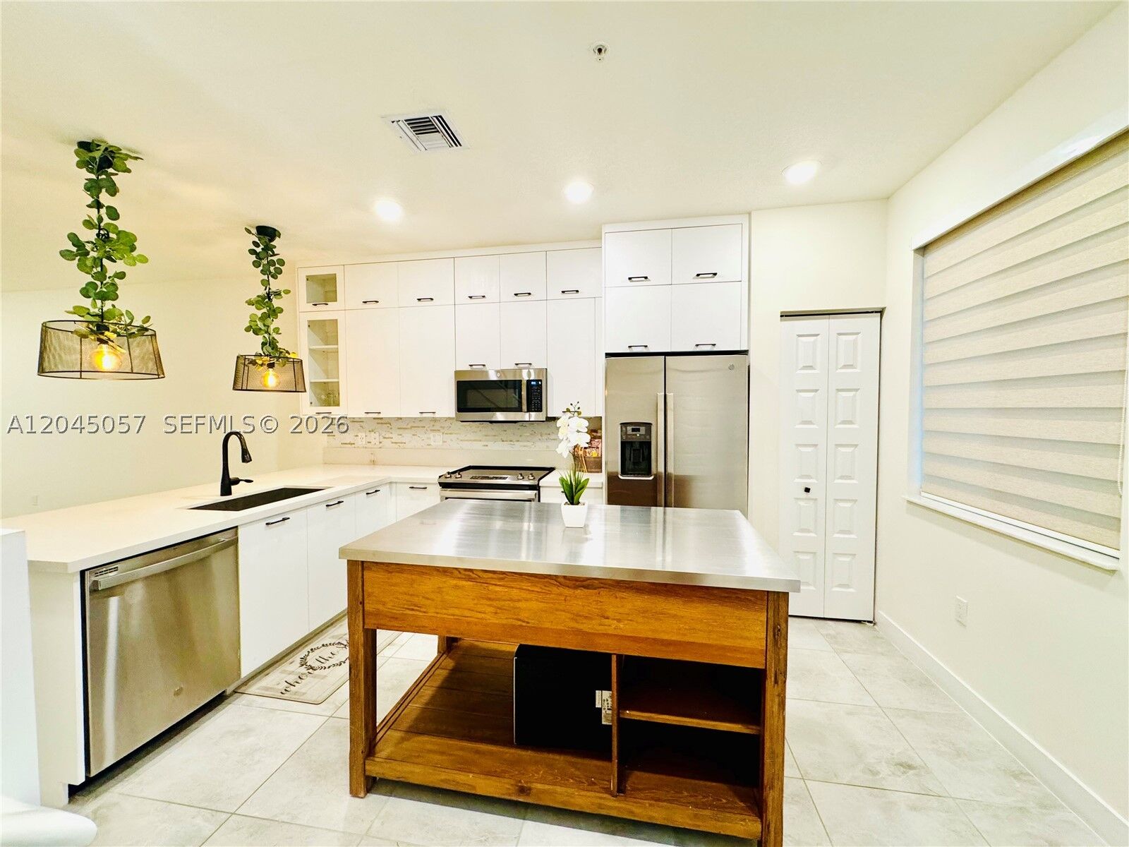Property Photo: 10295 NW 64th Ter 104 FL 33178