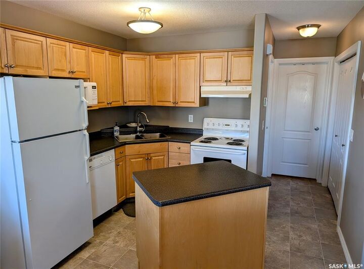 Property Photo: 4144 Buckingham Drive E SK S4V 3A9