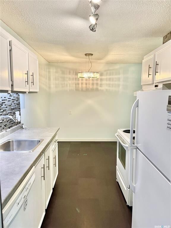 Property Photo:  207C Tait Place 150  SK S7H 5L8 