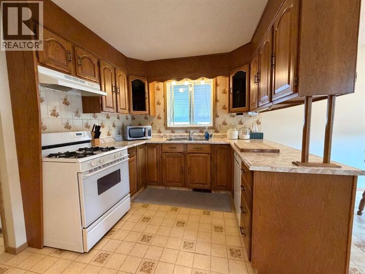 Property Photo:  530 20 Street  AB T9W 1H8 