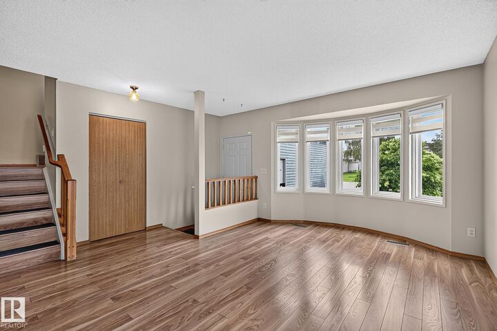Property Photo:  12443 55 Street NW  AB T5W 5E7 