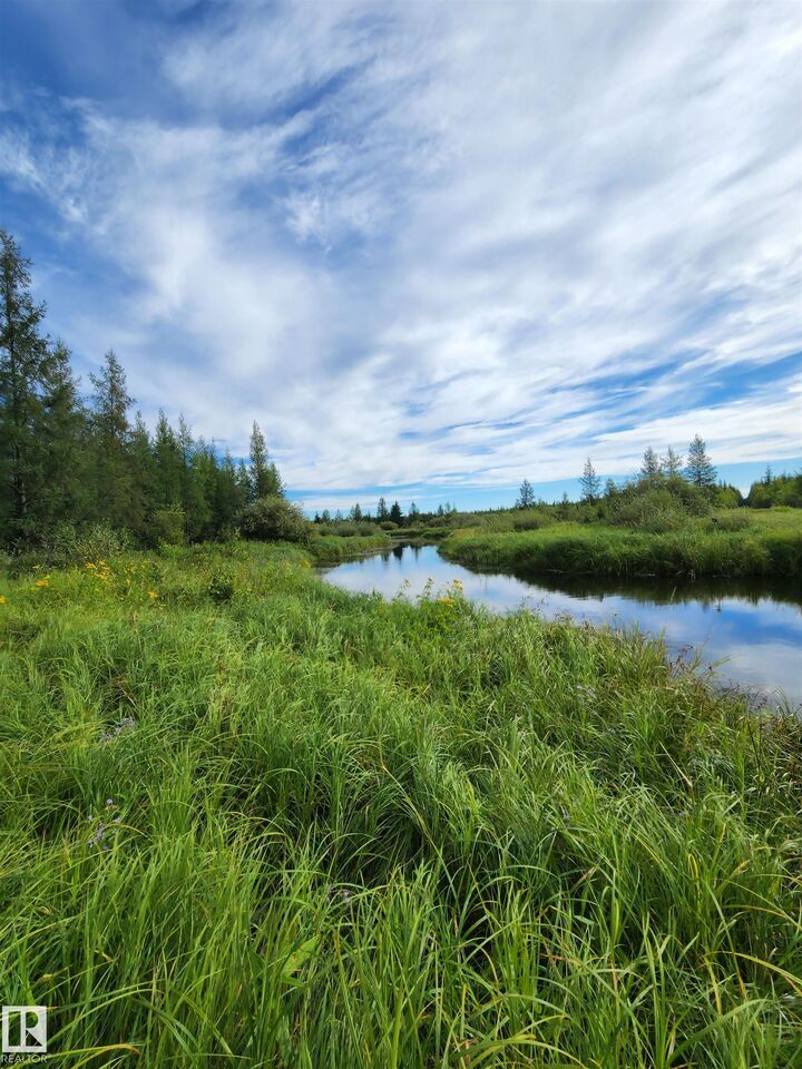 Property Photo:  Rr62 W5th R6 T59 S22 SE  AB T7N 1N3 