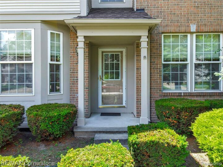 Property Photo:  8307 Parkside Drive  MI 48185 4608 