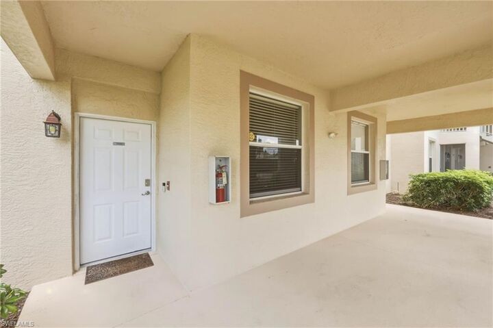 Property Photo: 21360 Lancaster Run 1513 FL 33928