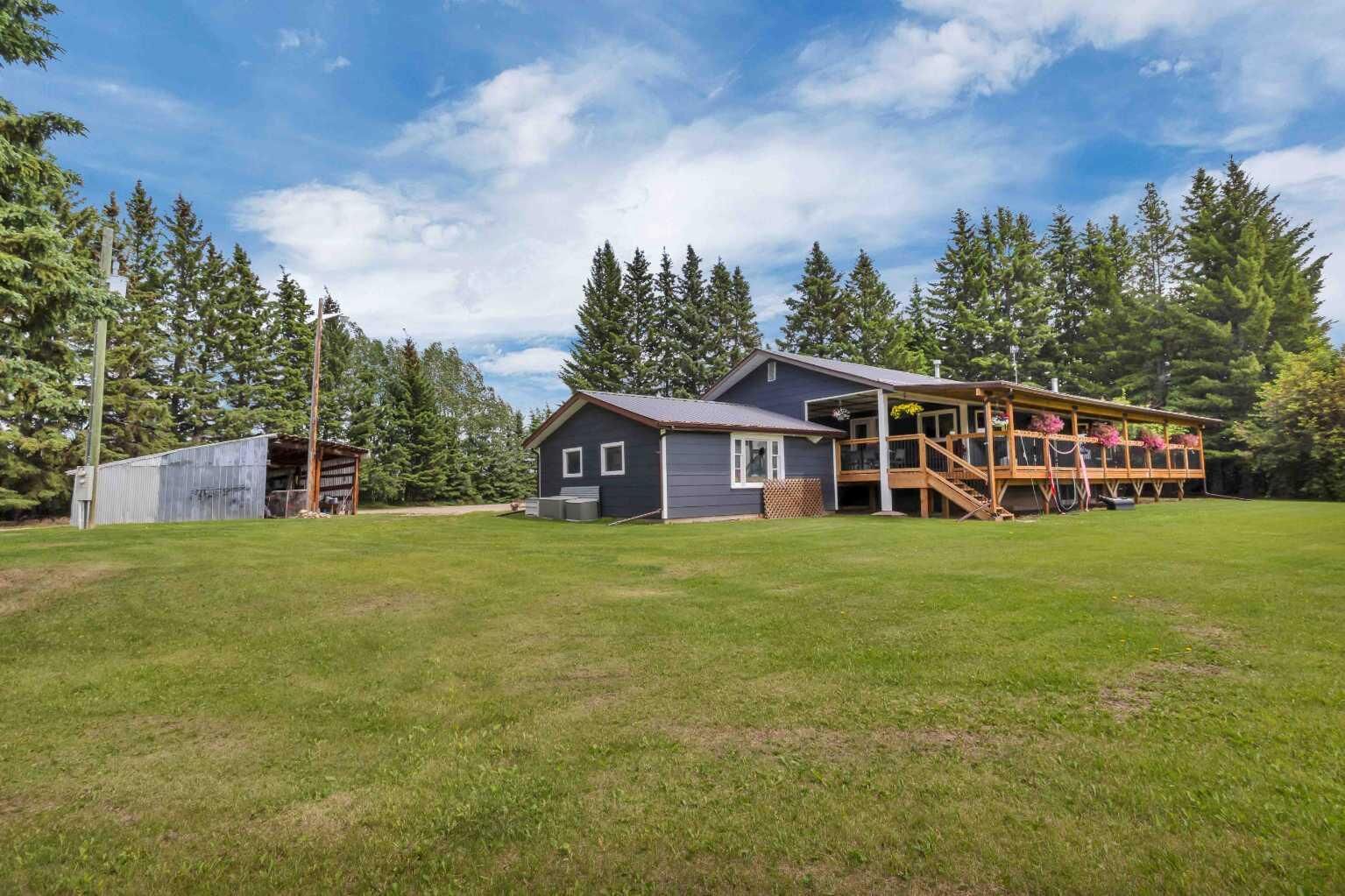 Property Photo: 384082 22 Highway AB T4T 1J6