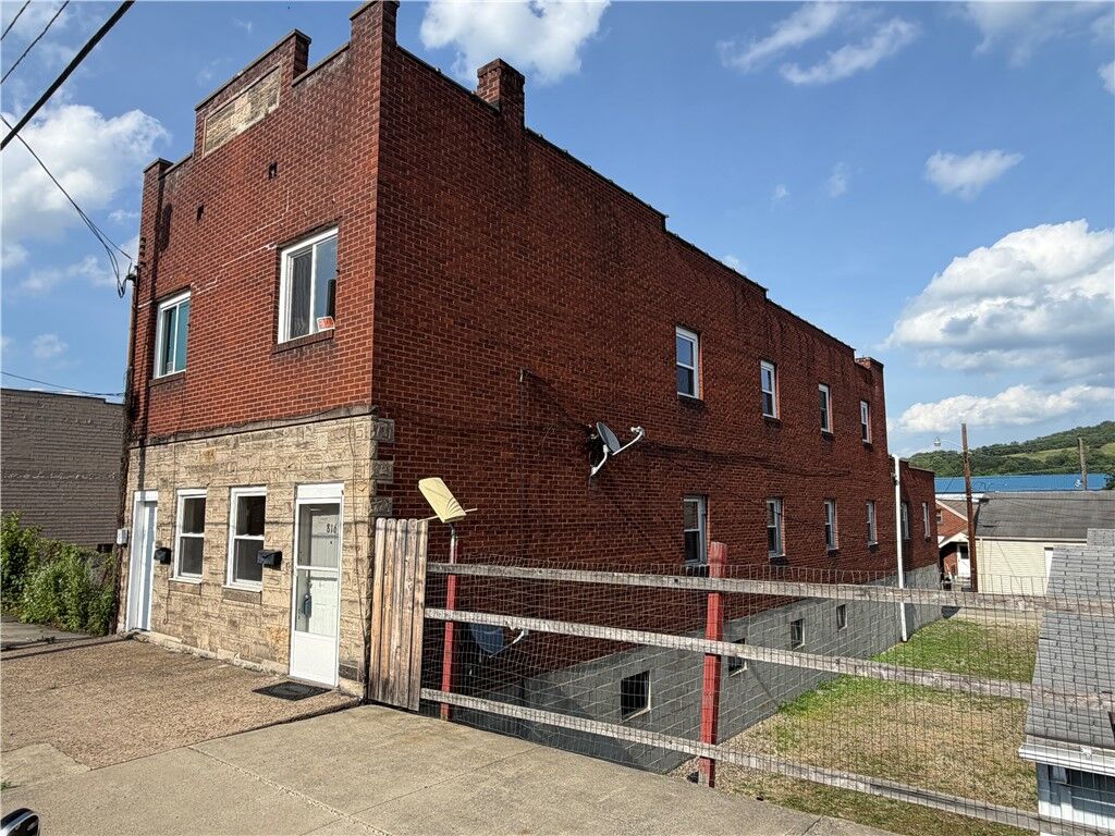 Property Photo:  816-818 McKean  PA 15033 