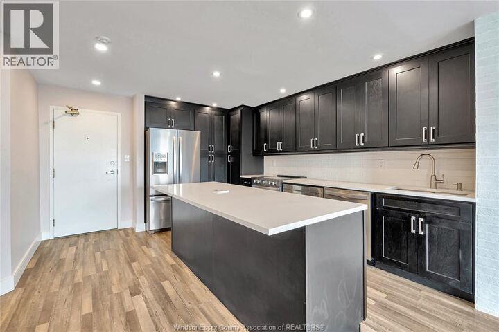 Property Photo: 75 Riverside Drive East 1902 ON N9A 4C4