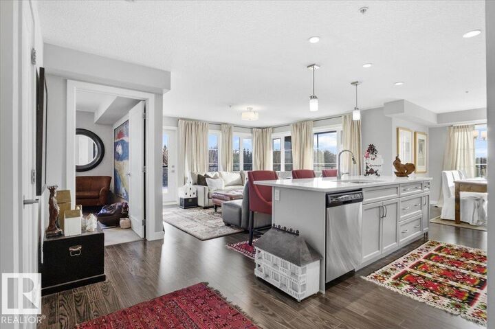 Property Photo: 5029 Edgemont Boulevard NW 211 AB T6M 0S8