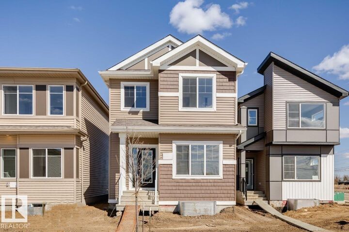 Property Photo: 305 Edgemont Drive NW AB T6M 3G7