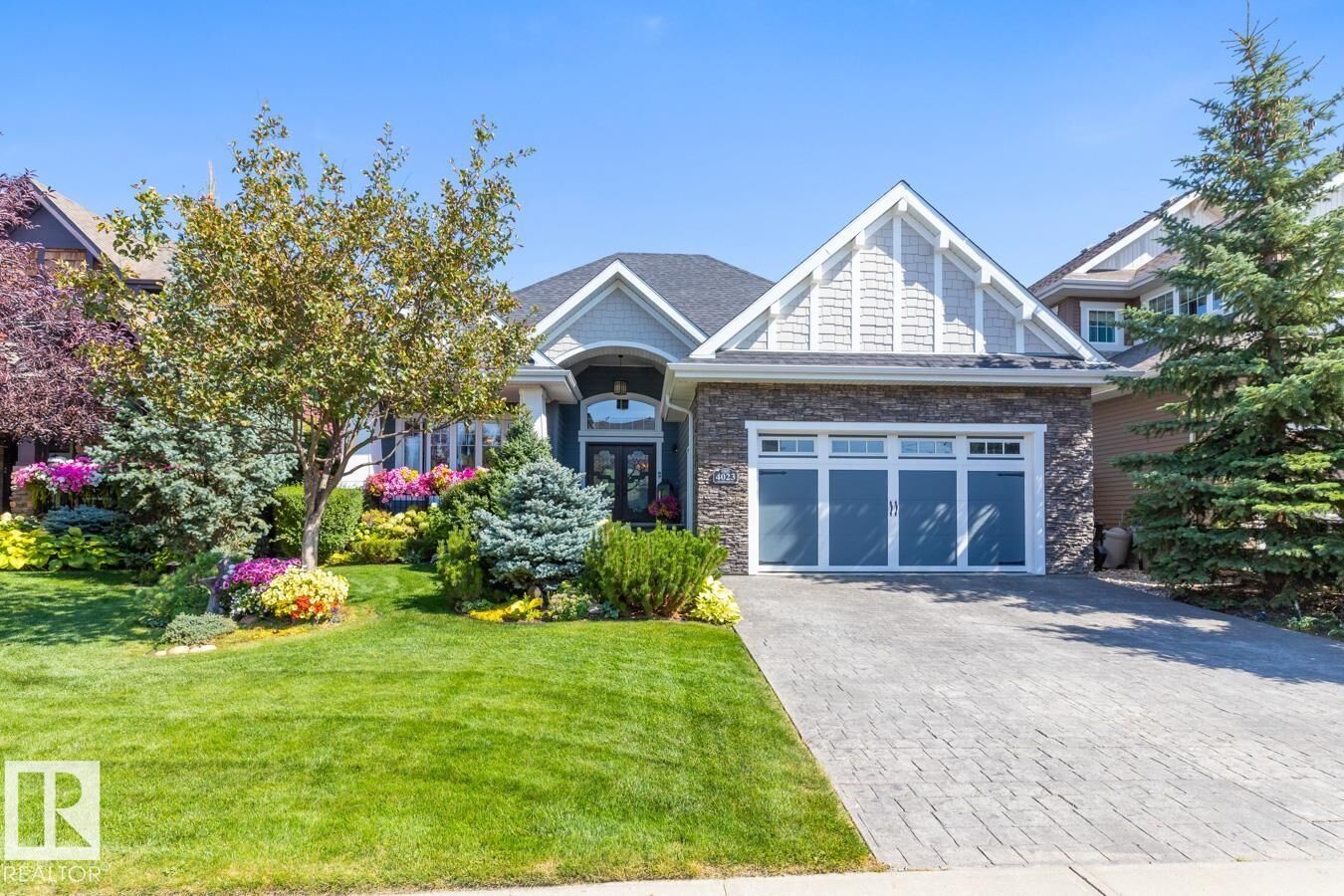 Property Photo: 4023 Whispering River Drive NW AB T6W 0T5