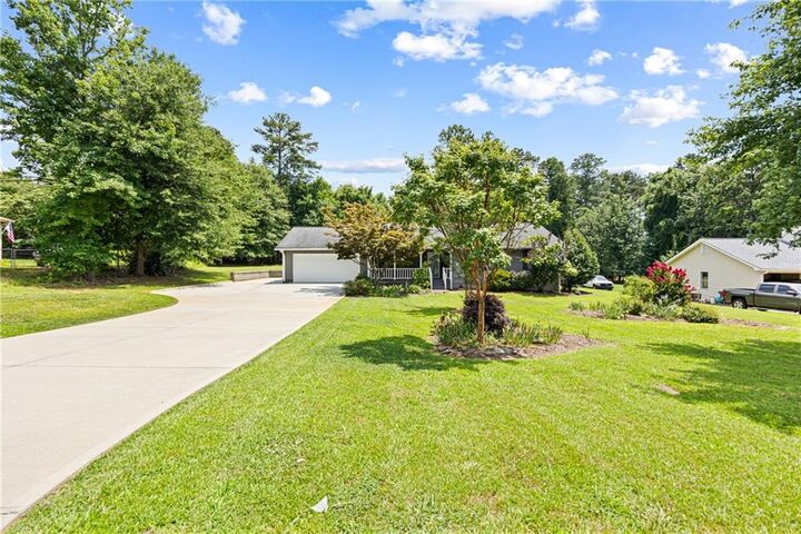 Property Photo:  5671 Raintree Trace  GA 30566 