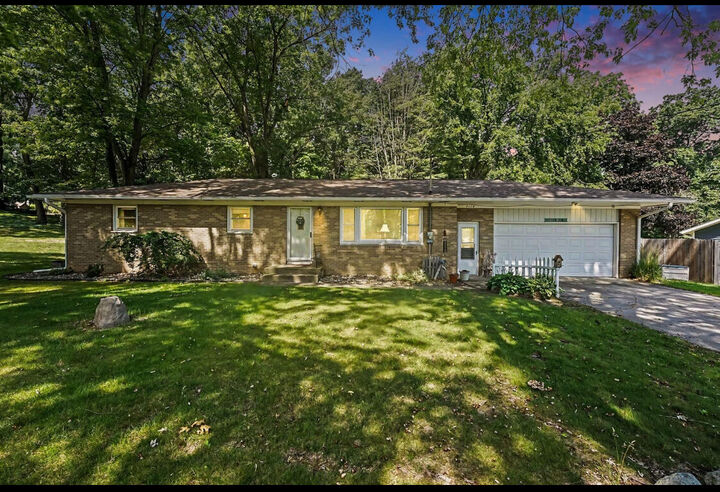Property Photo:  7114 Kay Drive  MI 48838 