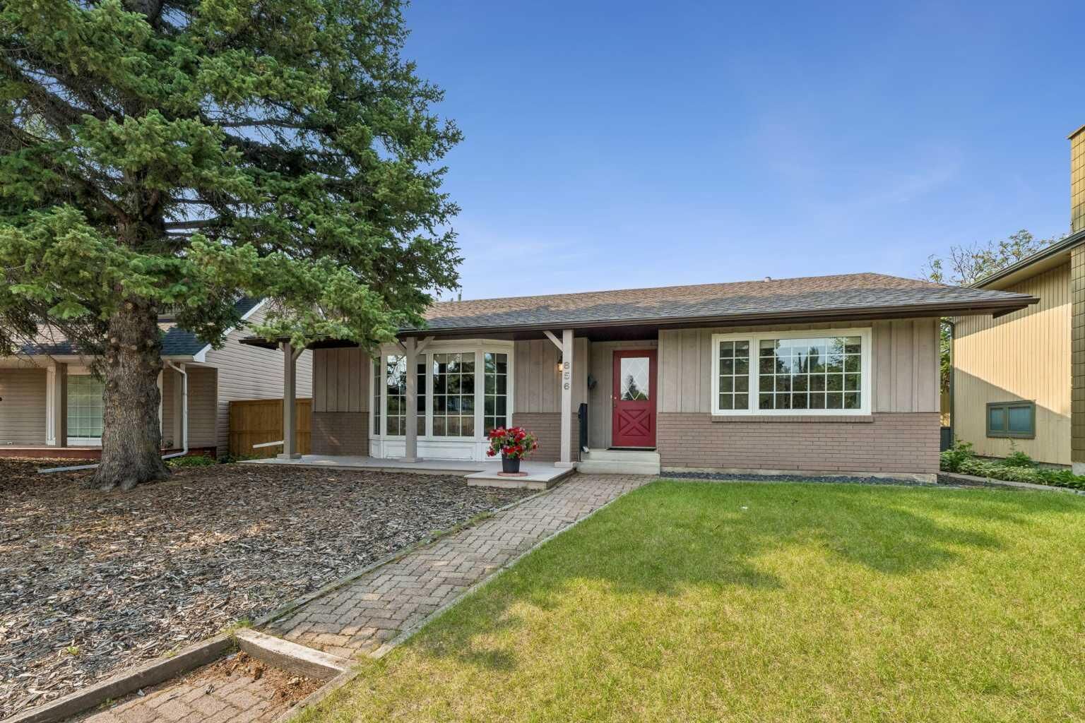 Property Photo: 856 Lake Twintree Crescent SE AB T2J 2W3
