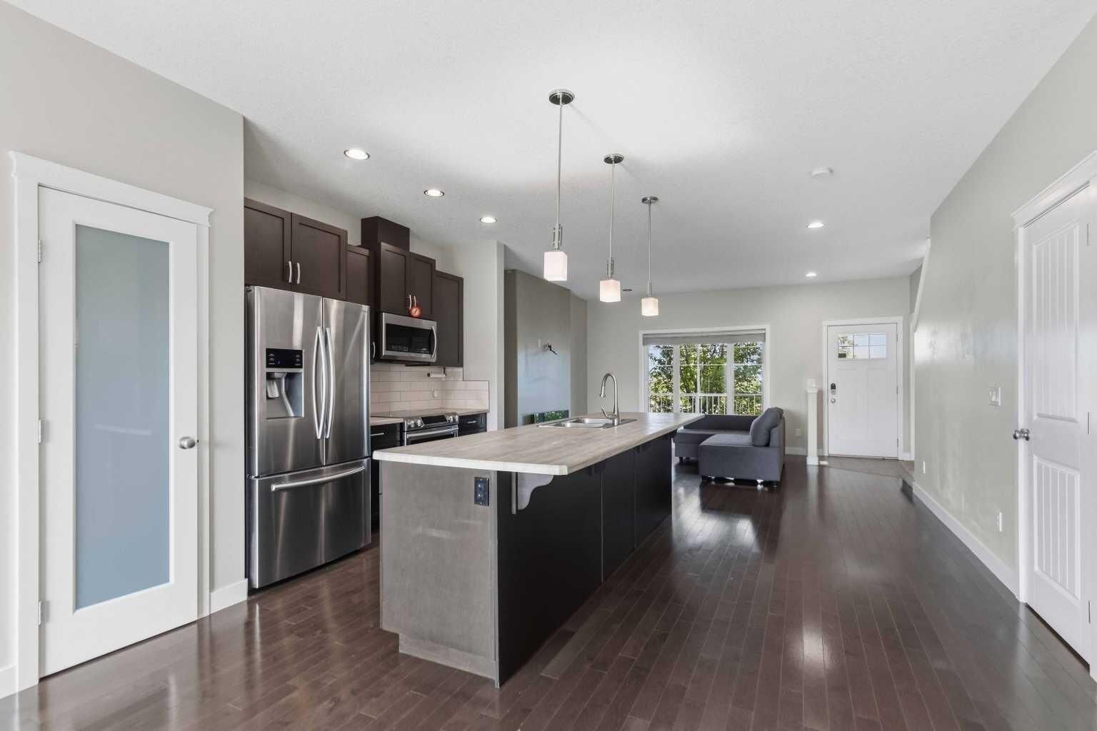 Property Photo: 445 Heritage Drive AB T9L 1S4