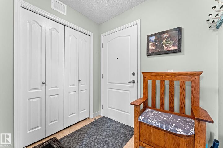 Property Photo: 12650 142 Avenue NW 214 AB T5X 0J4