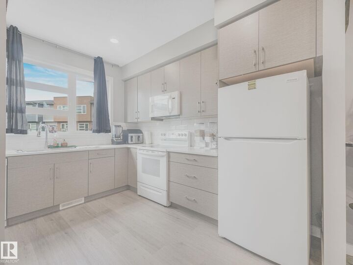 Property Photo: 17635 58 Street NW 92 AB T5Y 4C2