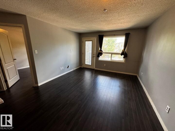Property Photo:  9357 Simpson Drive NW 2211  AB T6R 0N3 