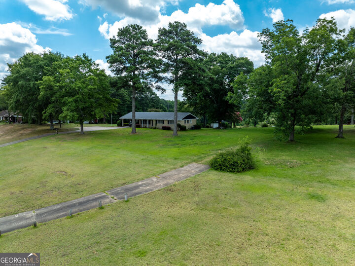 Property Photo: 7359 Pleasant Hill Road GA 30058