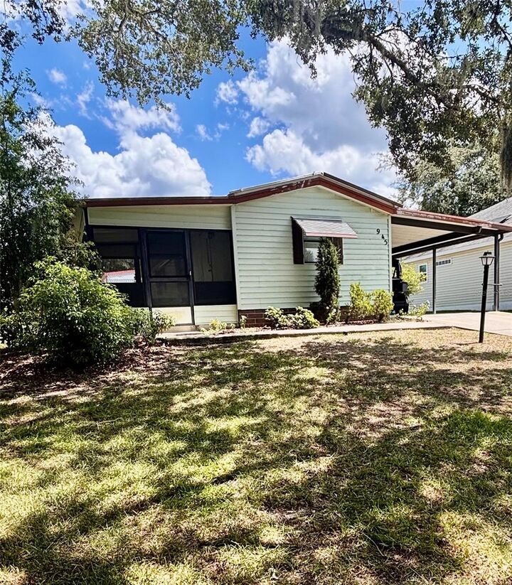 Property Photo:  945 Tarrson Boulevard  FL 32159 