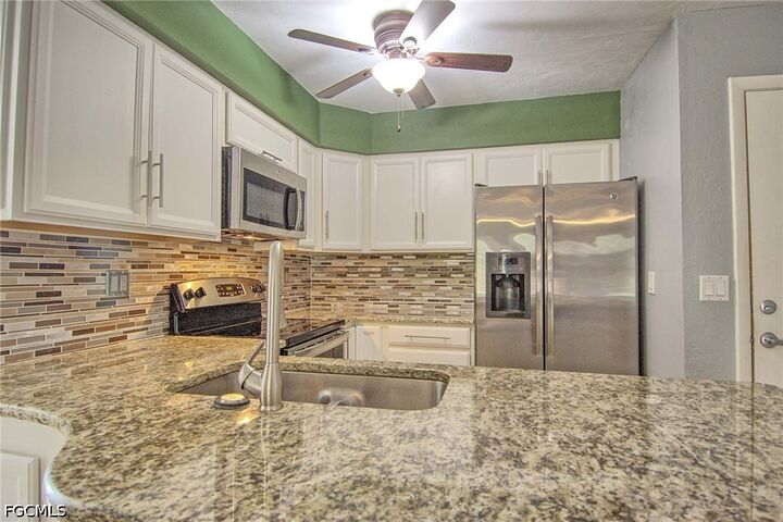 Property Photo:  1100 Pondella Road 807  FL 33909 