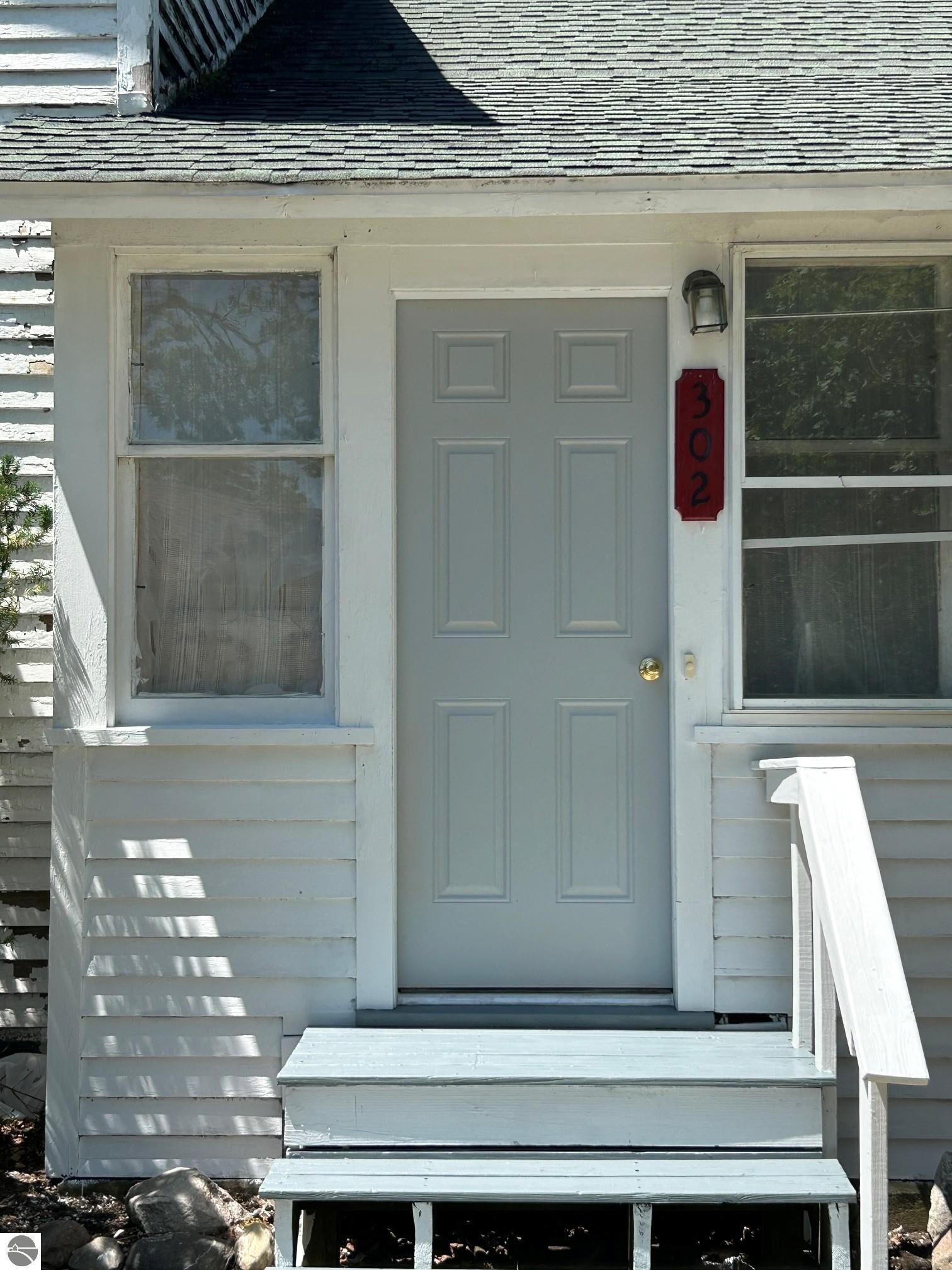 Property Photo:  302 S Pine Street  MI 48858 