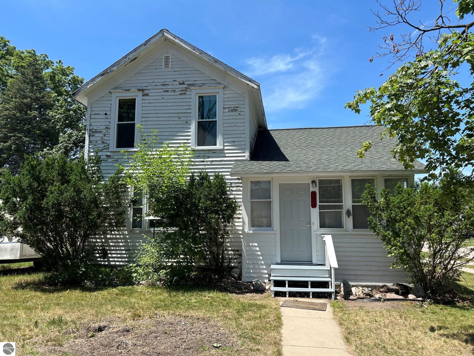 Property Photo:  302 S Pine Street  MI 48858 
