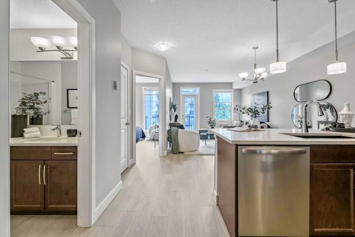 Property Photo:  15304 Bannister Road SE 211  AB T2X 0M8 